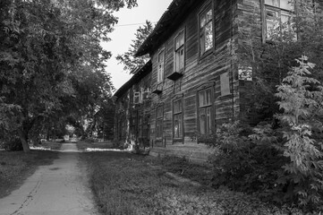 Street with old wooden houses. The concept idea for the visualization of scary or creepy stories