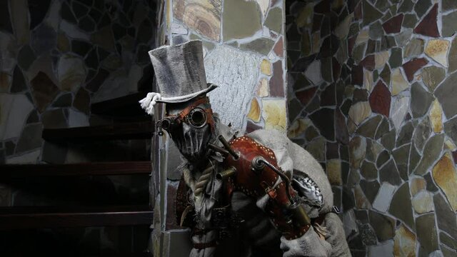 Futuristic character cyborg stalker. Art Photography in steampunk style 4K Footage.