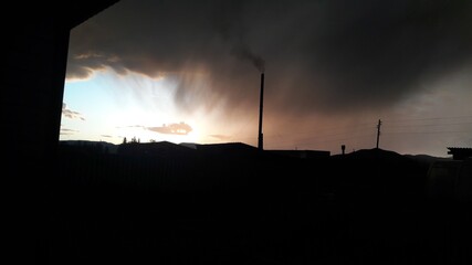 silhouette of a factory