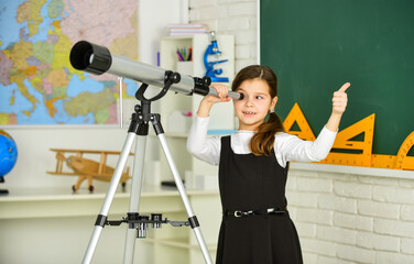 teachers day. Little girl using telescope. Telescope on tripod. School subjects set. School...