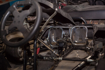 Close up of a kart's steering wheel.