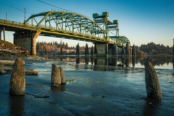 Bullards Bridge in Bandon, Oregon. Old Pilings in foreground. 