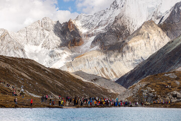 Colorful in autumn forest and snow mountain at Yading nature reserve