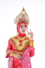 Beautiful smiling Asian girl wearing a set of modern traditional clothes, the traditional female outfits originated from Indonesia. Indonesian Women isolatedd white background