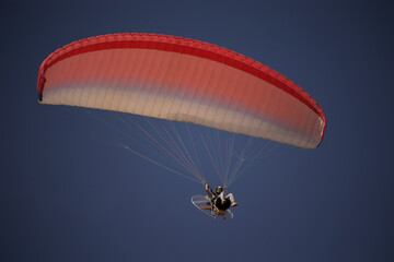 paragliding in the blue sky