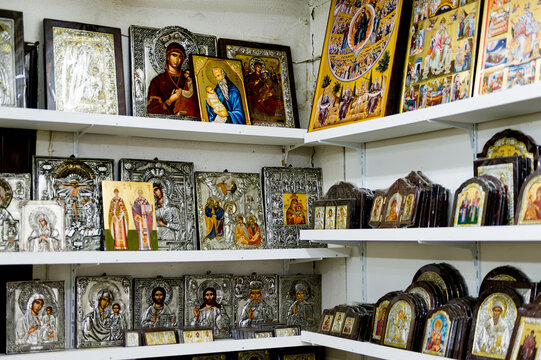 KALAMBAKA, GREECE - MAR 20, 2015: Multiple icons in the souvenir shop in Greece. Icon is popular souvenir from  Greece