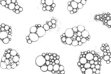 Soap bubbles pattern isolated on white background. Transparent bubbles group on liquid surface texture