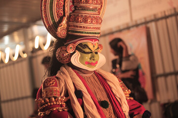 Kathakali dancer in green face paint