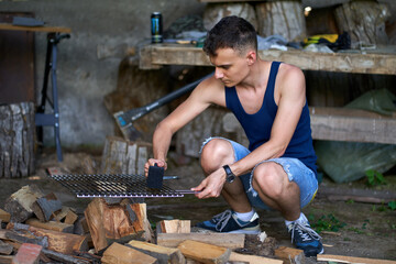 Man preparing the grill