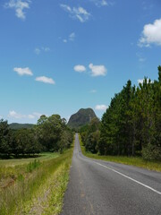 Fototapeta na wymiar road leading up to a rocky mountain