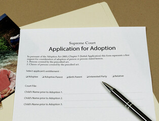 Application For Adoption papers ready to be completed and signed.