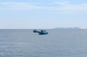 Obraz premium Boats floating in the sea, Tioman Island