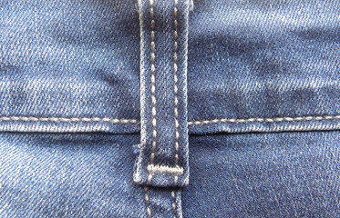 Fototapeta premium Raised belt loop detail of blue jeans