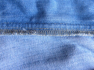 Combination stitched superimposed side seam on blue color jeans