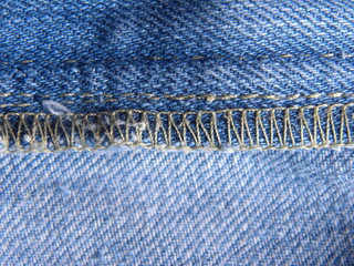 Zigzag stitch on blue color jeans