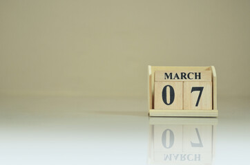 March 7, Number cube with the reflection on the ground.