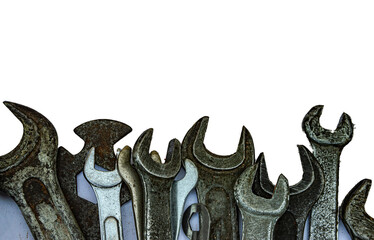 wrenches iron dirty and old on a white background close-up