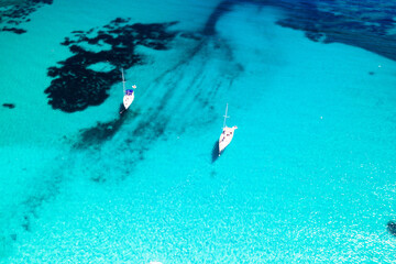 Croatia, Dugi otok. Scenic blue lagoon with anchored yachts, overhead view of sea paradise

