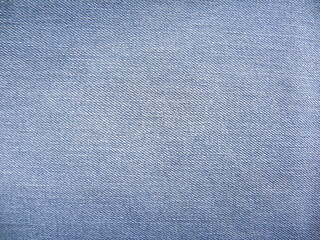 Fototapeta na wymiar Blue color vintage denim jeans background