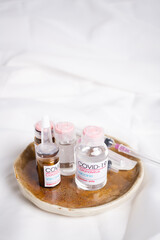 Bottle of coronavirus vaccine on table.
 Coronavirus vaccine COVID-19.