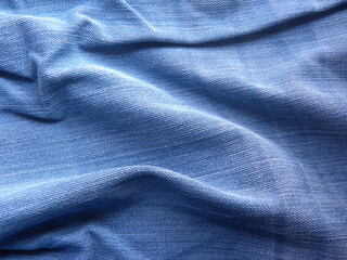Naklejka na ściany i meble Light blue color jeans with wrinkles background