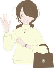 手を上げて待ち合わせをしている笑顔の女性