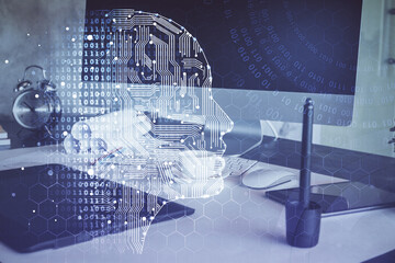 Multi exposure of work space with computer and human brain hologram. Brainstorm concept.