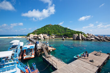 photo taken on a wide-angle lens, panoramic view of the azure sea and the beach of koh tao island in thailand, transparent sea, picturesque island, paradise pleasure, travel and vacation