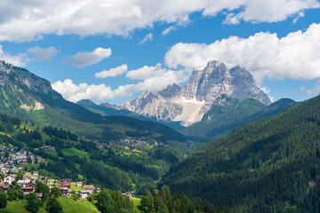 Fototapeta na wymiar Dolomites town village in valley in North Italy, selva di cadore and santa fosca