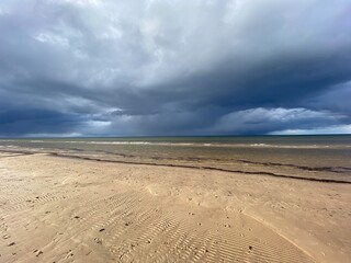 Fototapeta na wymiar Spiaggia e tempesta