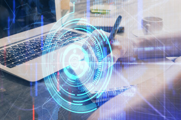 Multi exposure of writing hands on background with data solution hologram. Technology concept.