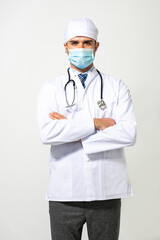 doctor with uniform and mask protection on white