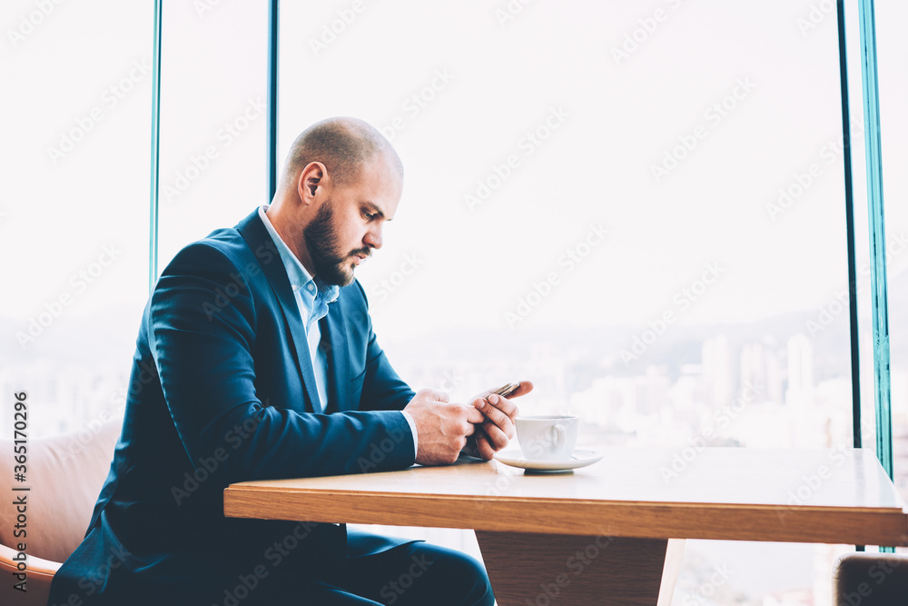 Poster pensive creative manager confirming online order on internet website on smartphone via high speed in