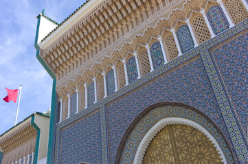 Facade of the Dar el-Makhzen palace with golden doors in Fes, Morocco