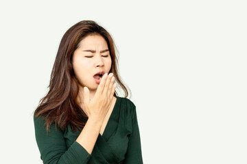 Asian woman open mouth and checking her breath having problem with bad smell