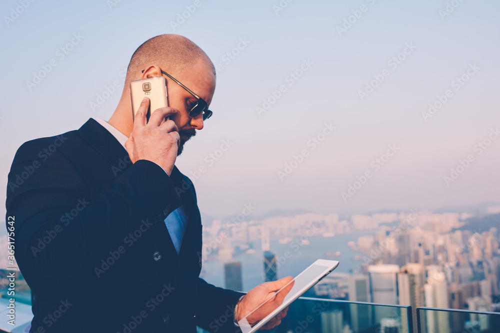 Poster side view of executive director in sungasses received email with financial reports and calling to em