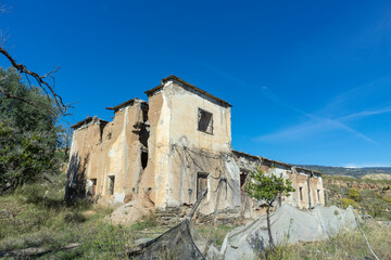 Fototapeta na wymiar ruined country house in the mountains