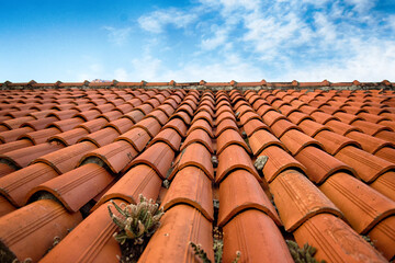 A tiled roof and the sky