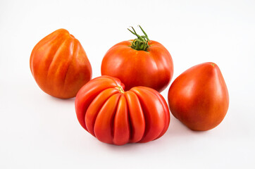 Red tomatoes on isolated on a white background.