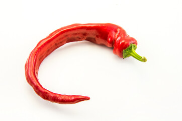 Red hot chili peppers on a white background.