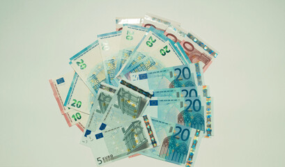 banknotes of european money lie on a white background