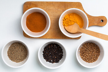 A set of spices and herbs for cooking.