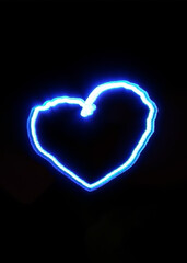 Light painting, heart symbol, combination of blue and white light against black background