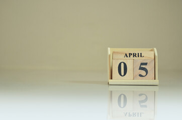 April 5, Number cube with the reflection on the ground.
