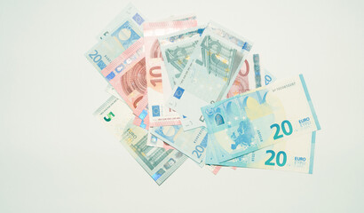 banknotes of european money lie on a white background
