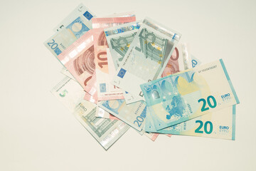 banknotes of european money lie on a white background
