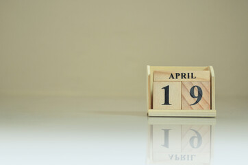 April 19, Number cube with the reflection on the ground.