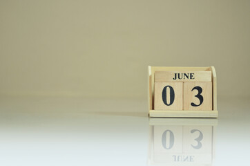 June 3, Number cube with the reflection on the ground.