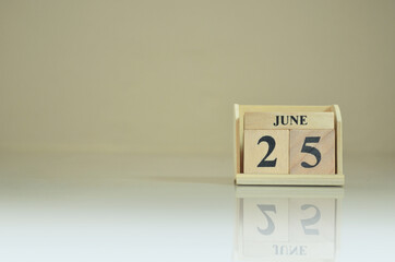 June 25, Number cube with the reflection on the ground.
