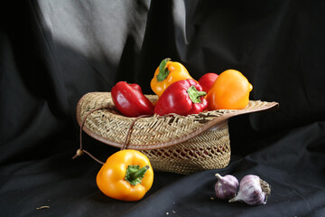 man holding basket of vegetables